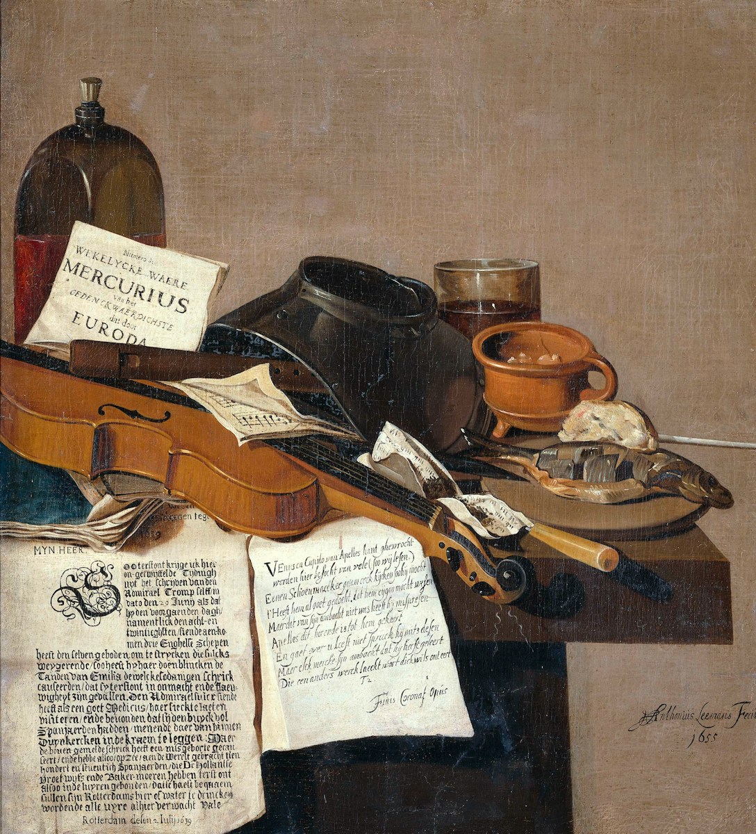 Photo by Europeana brown and black wooden guitar and black leather bag<br />
get in touch
